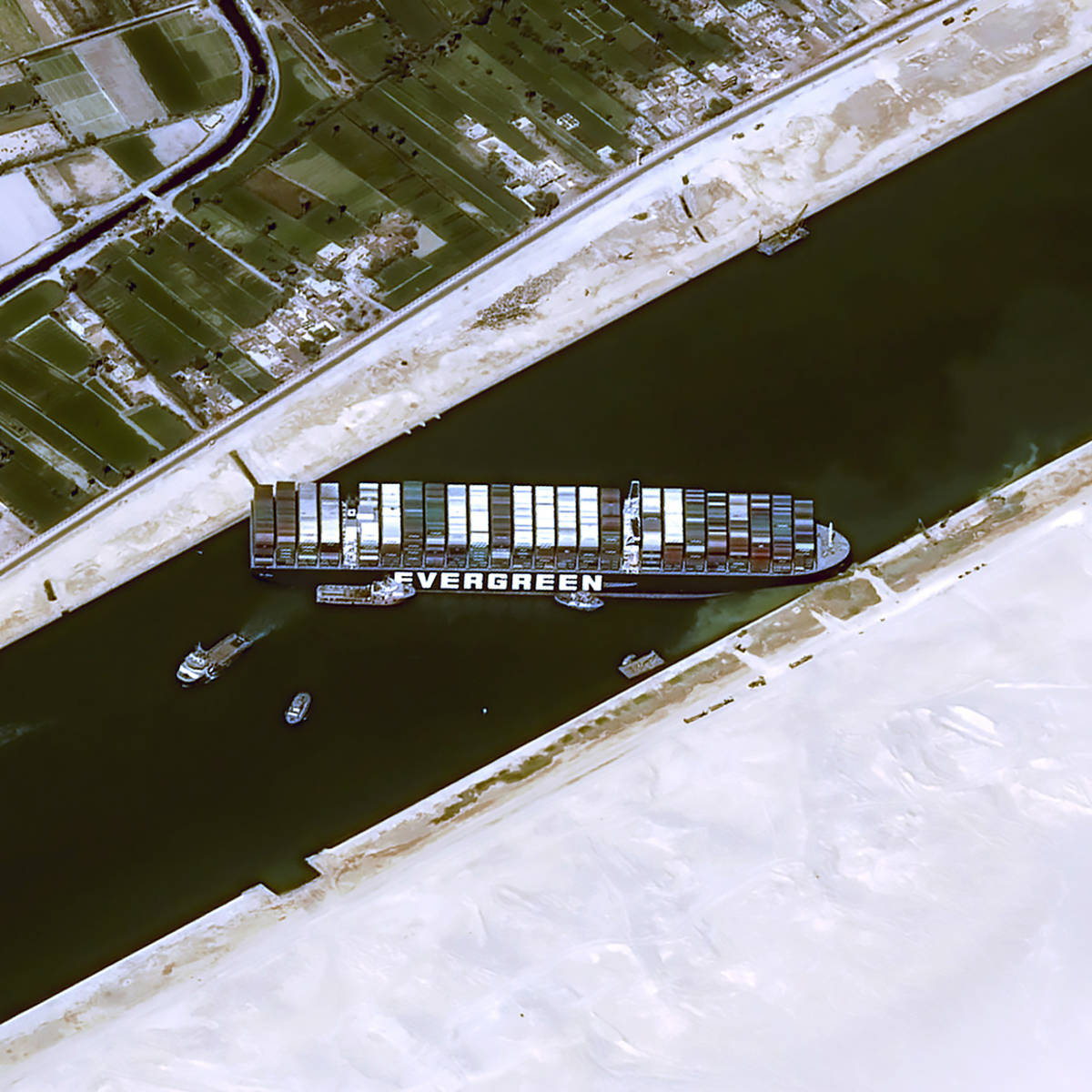 This satellite image from Cnes2021, Distribution Airbus DS, shows the cargo ship MV Ever Given ...