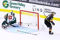 Golden Knights left wing Max Pacioretty (67) scores a goal in overtime past Minnesota Wild goal ...