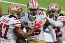 San Francisco 49ers cornerback Richard Sherman (25) is greeted by teammates after Sherman inter ...