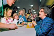 Beverly Cleary signs books at the Monterey Bay Book Festival in Monterey, Calif., in April 1998 ...