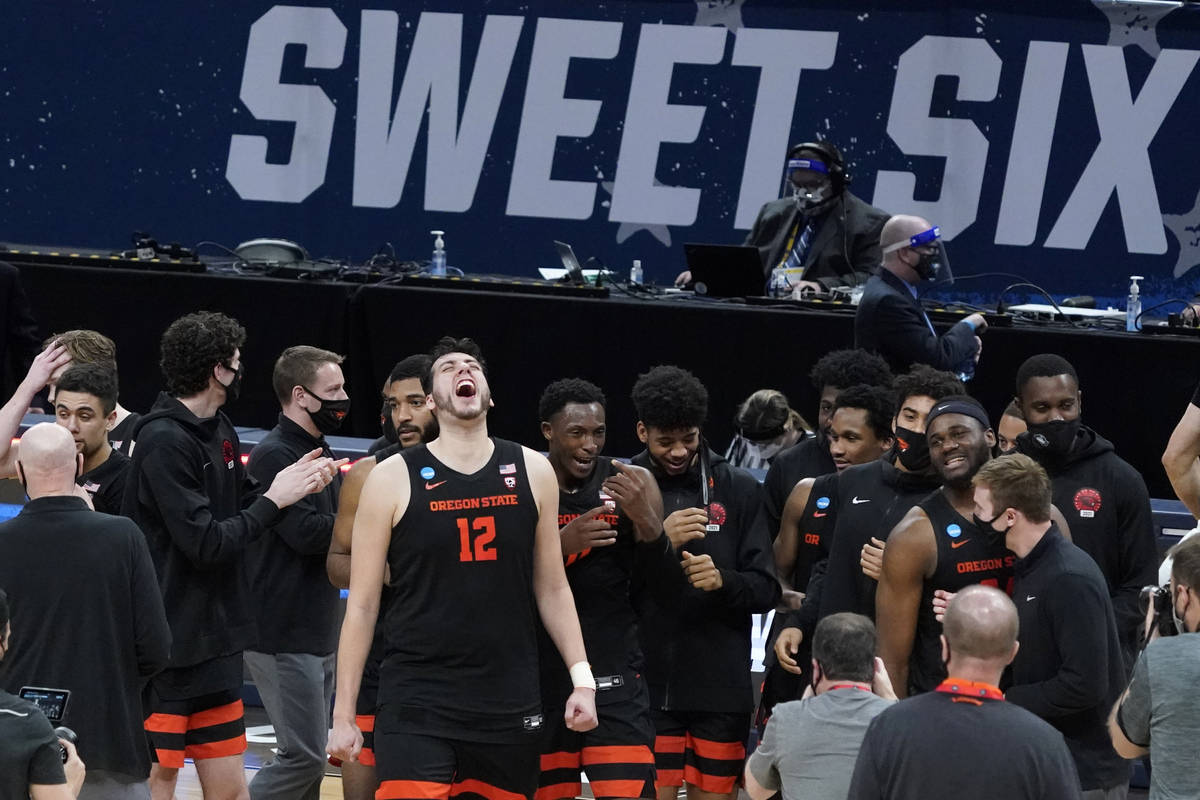 Oregon State center Roman Silva (12) celebrates after a Sweet 16 game against Loyola Chicago in ...
