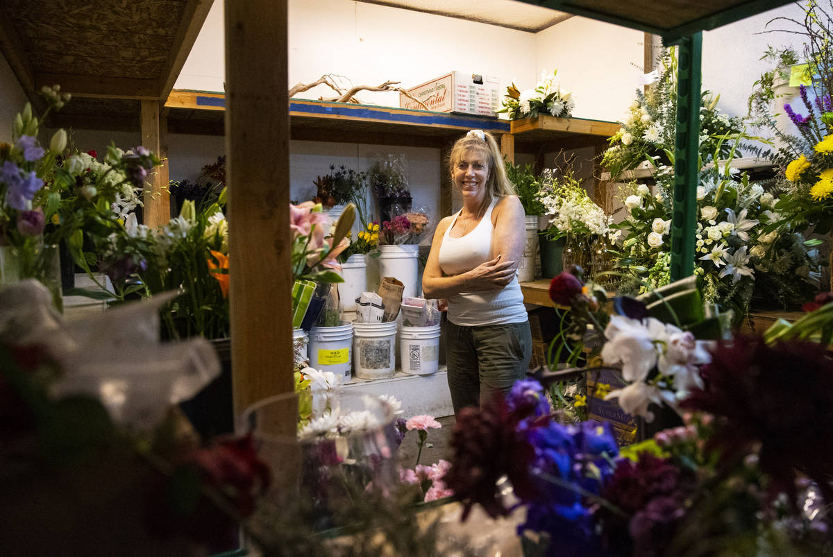 Debbie Newson-Babina, owner of Las Vegas Floral Wholesale, poses for a