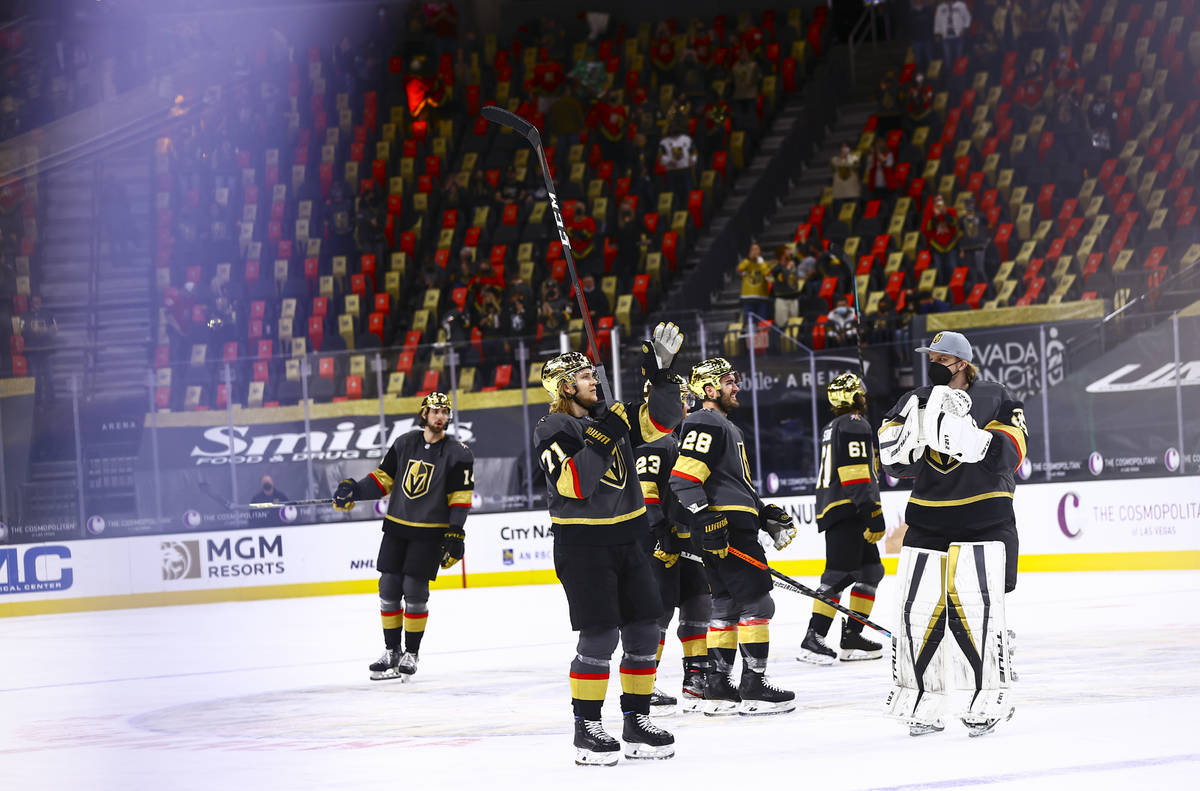 The Golden Knights celebrate after defeating the Los Angeles Kings in an NHL hockey game at T-M ...