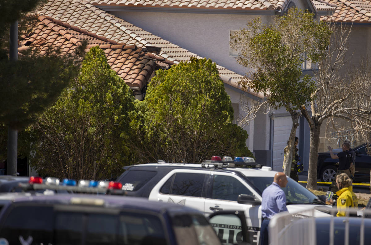 Burn marks and damage are about a house on the 6500 block of Caddington Avenue as the Clark Cou ...
