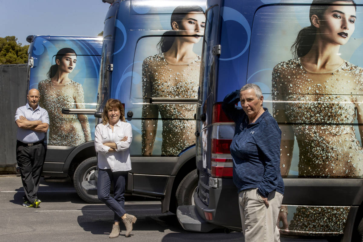 (From near) Driver Joann Matarazzo with Tiffany Cleaners owners Judy and Dan Del Rossi at their ...