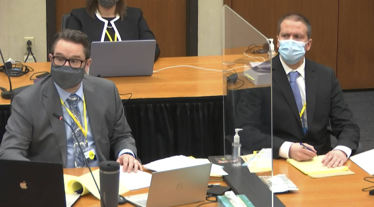 In this image from video, defense attorney Eric Nelson, left, and defendant former Minneapolis ...