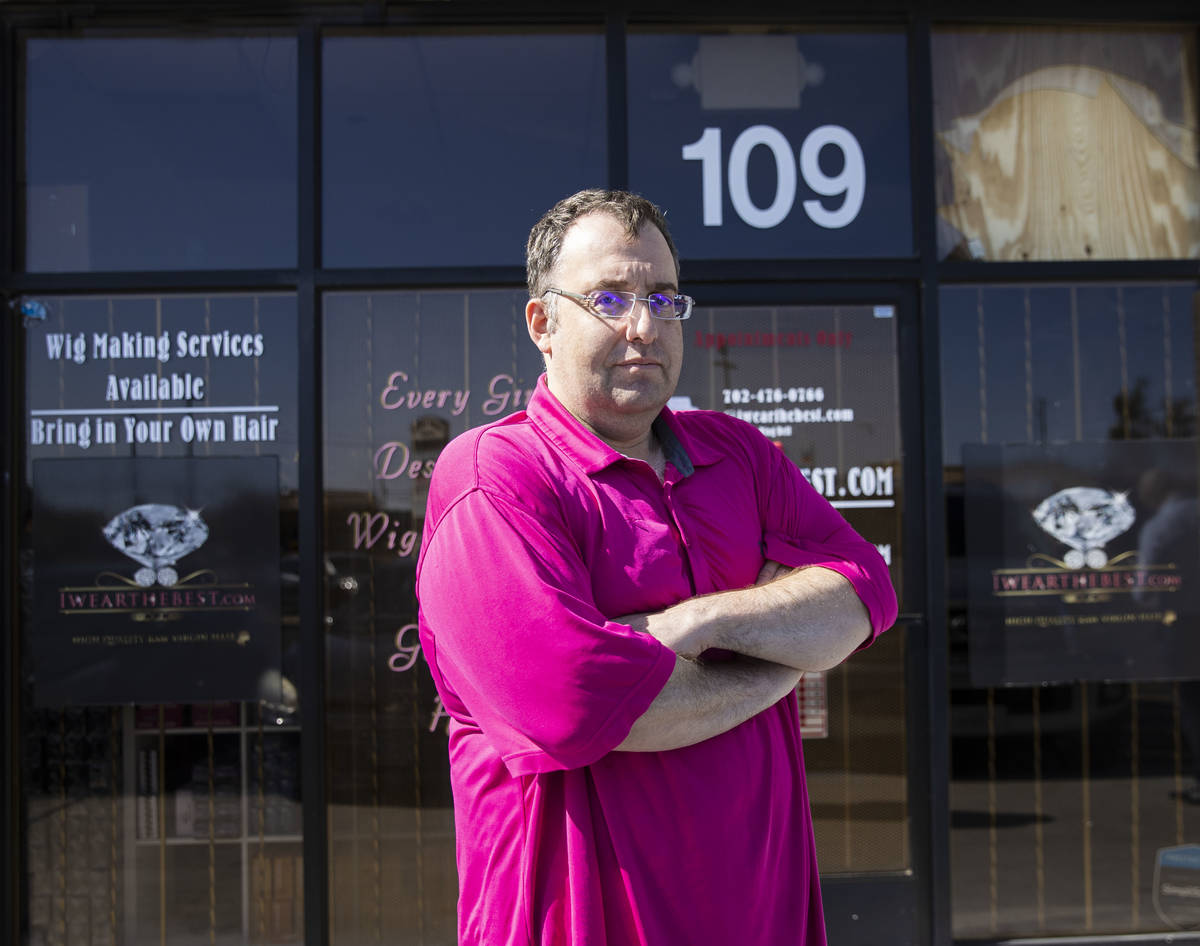 Dov Erlichman, a lead investor, poses for a photo in front of IWearTheBest.com, custom wigs and ...