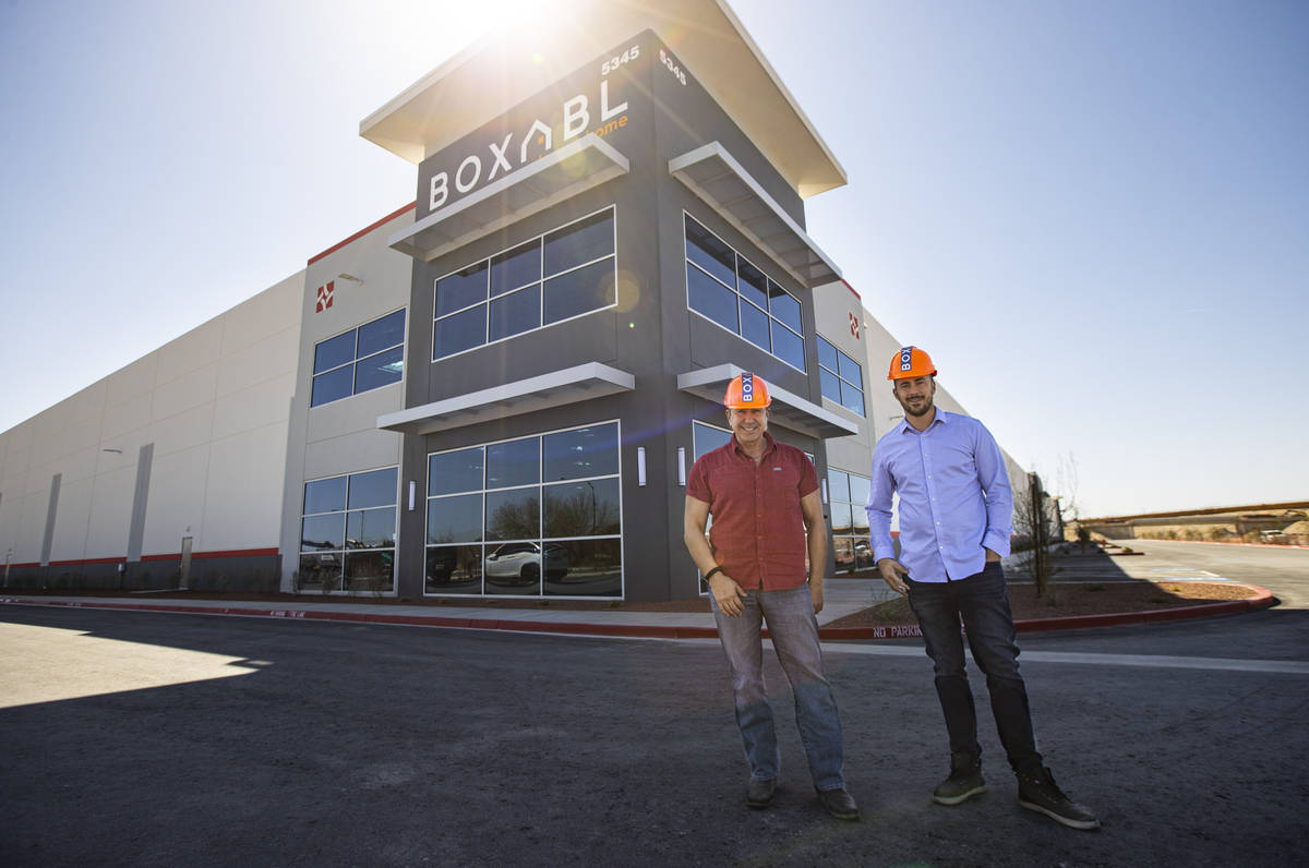 Paolo Tiramani, founder and CEO of Boxabl, left, and son and co-founder Galiano Tiramani pose f ...