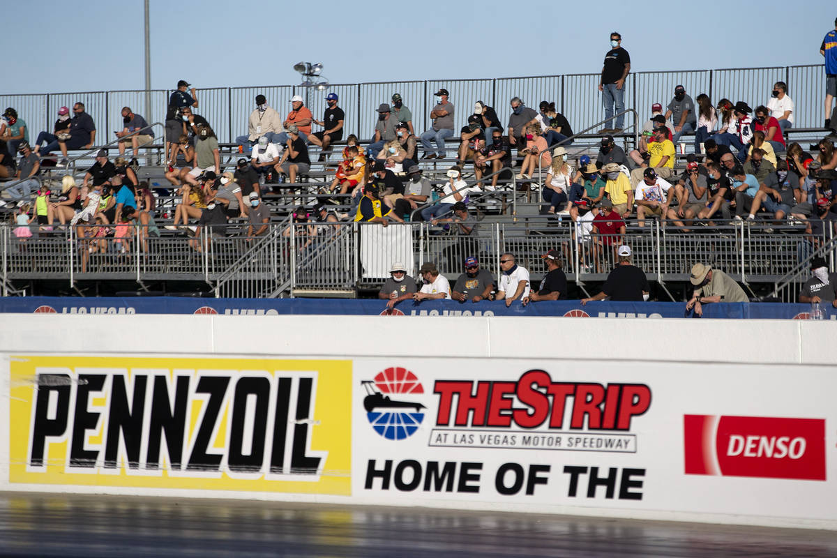 Fans watch as the Dodge NHRA Finals are underway at Las Vegas Motor Speedway on Sunday, Nov. 1, ...