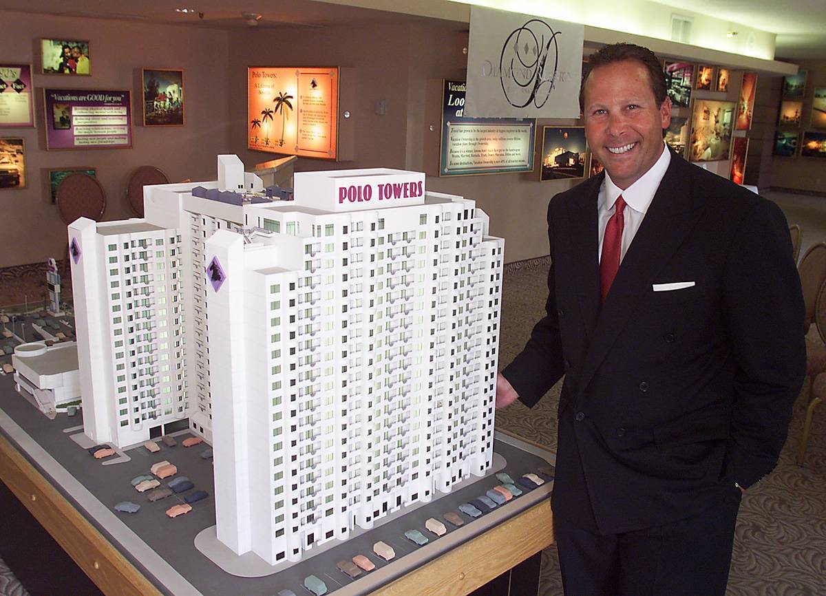 Stephen Cloobeck with model of a new tower being built at Polo Towers. (Review-Journal file)