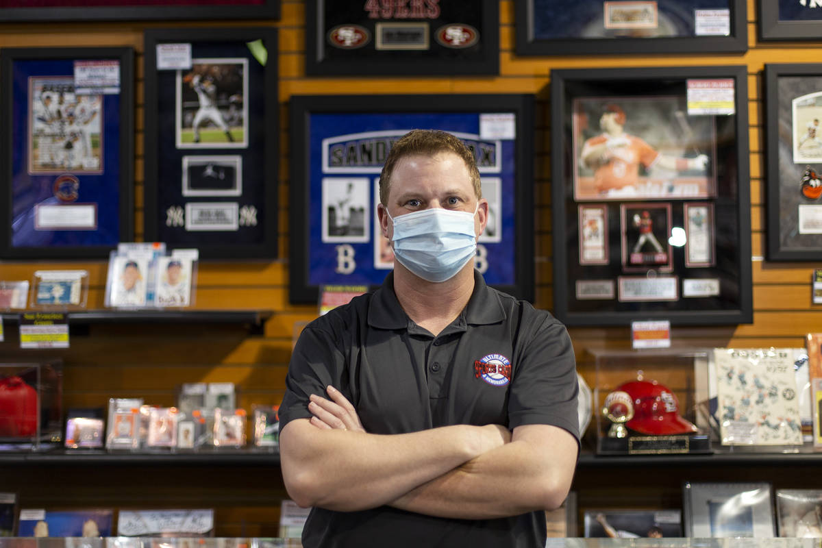 Jeremy Brown at his Neonopolis shop, Ultimate Sports Cards and Memorabilia, on Thursday, March ...