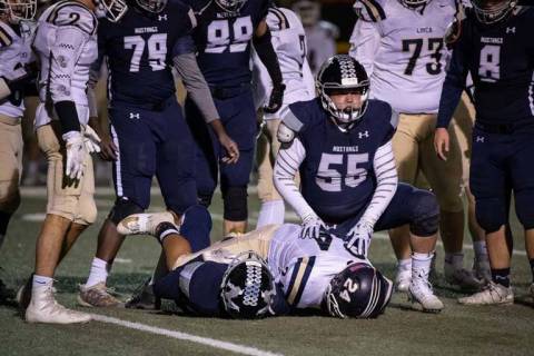 The Meadows' Blake Collier (55) gets up from a tackle against Lake Mead. He is one of three sen ...