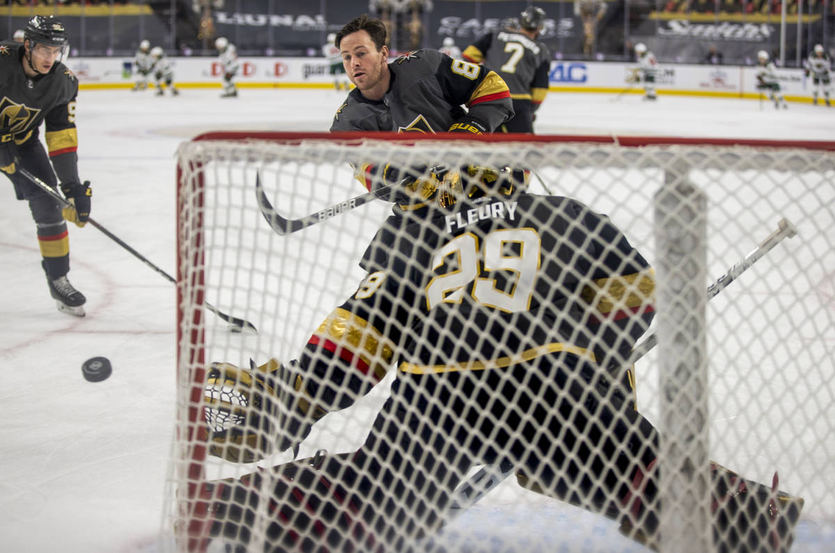 Golden Knights center Jonathan Marchessault (81) takes a shot on goaltender Marc-Andre Fleury ( ...