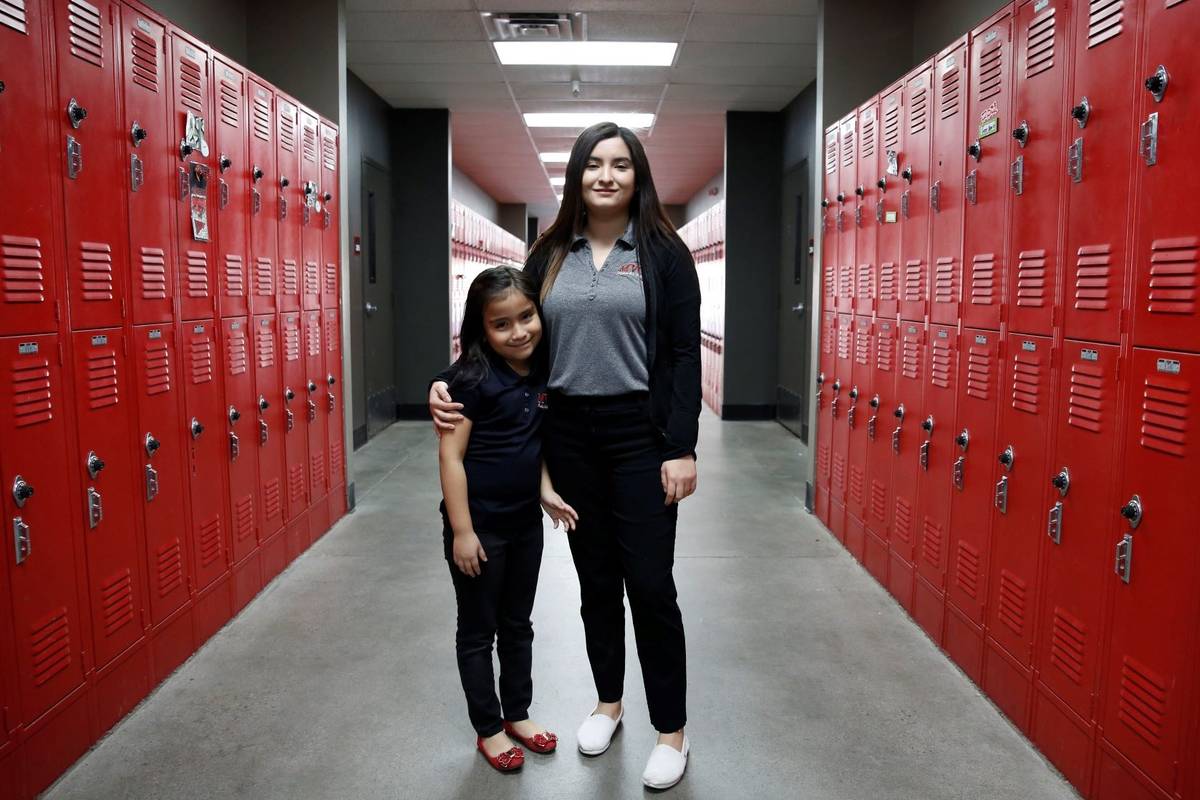 Daniela Lopez, a high school senior at Mountain View Christian School, right, poses for photo w ...