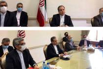This combined photo released by the Iranian Foreign Ministry, shows Iranian diplomats attending ...