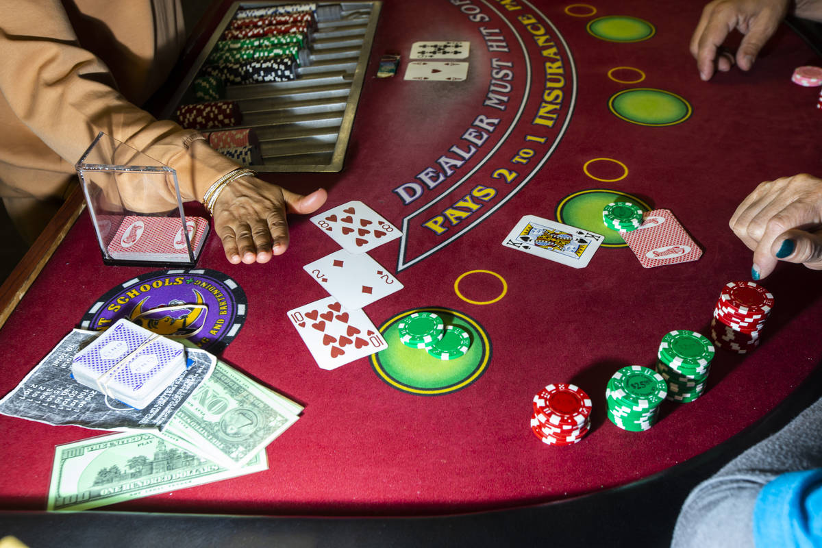 Instructor Yodit Girma works a blackjack table during class at the Crescent School of Gaming an ...