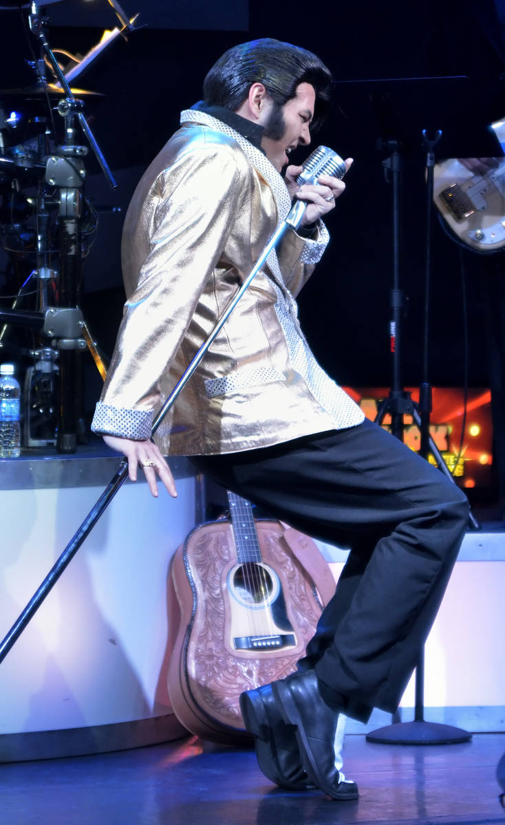 Travis Allen performs as Elvis Presley during "All Shook Up" at the V Theater in the Miracle Mi ...