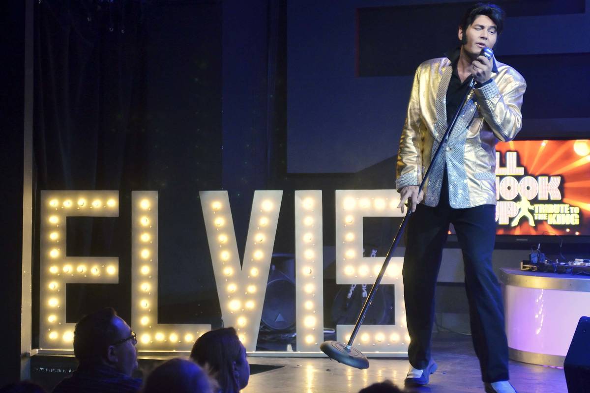 Travis Allen performs as Elvis Presley during "All Shook Up" at the V Theater in the Miracle Mi ...