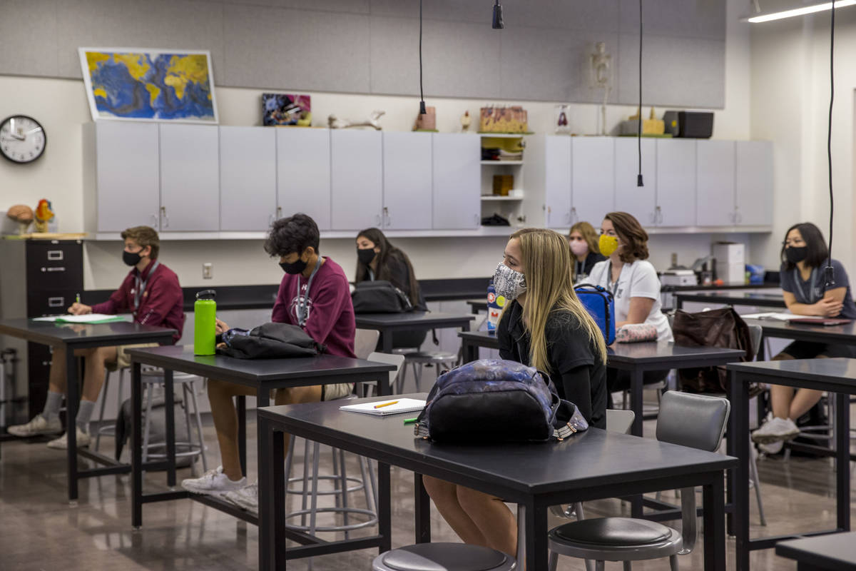 Students keep socially distanced while attending Steve Morrill's anatomy and physiology class a ...