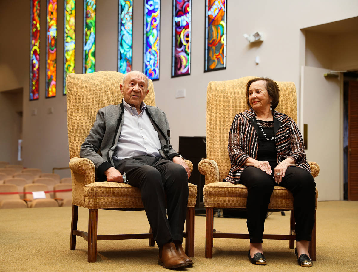 Holocaust survivors Henry Kronberg, left, and Judy Mack, right, speak about their experiences a ...