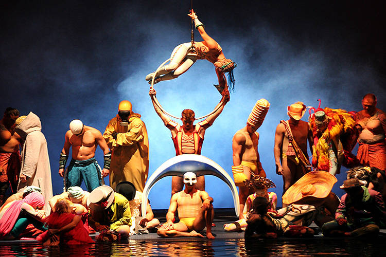 The cast of Cirque du Soleil's "O" perform during a 10th anniversary show at the Bellagio hotel ...