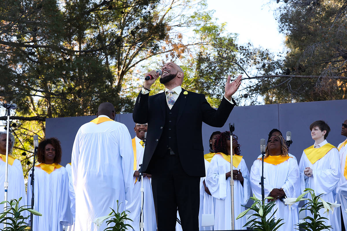 James Smith sings alongside the Las Vegas Mass Choir at the 36th Annual Easter Sunrise Service ...