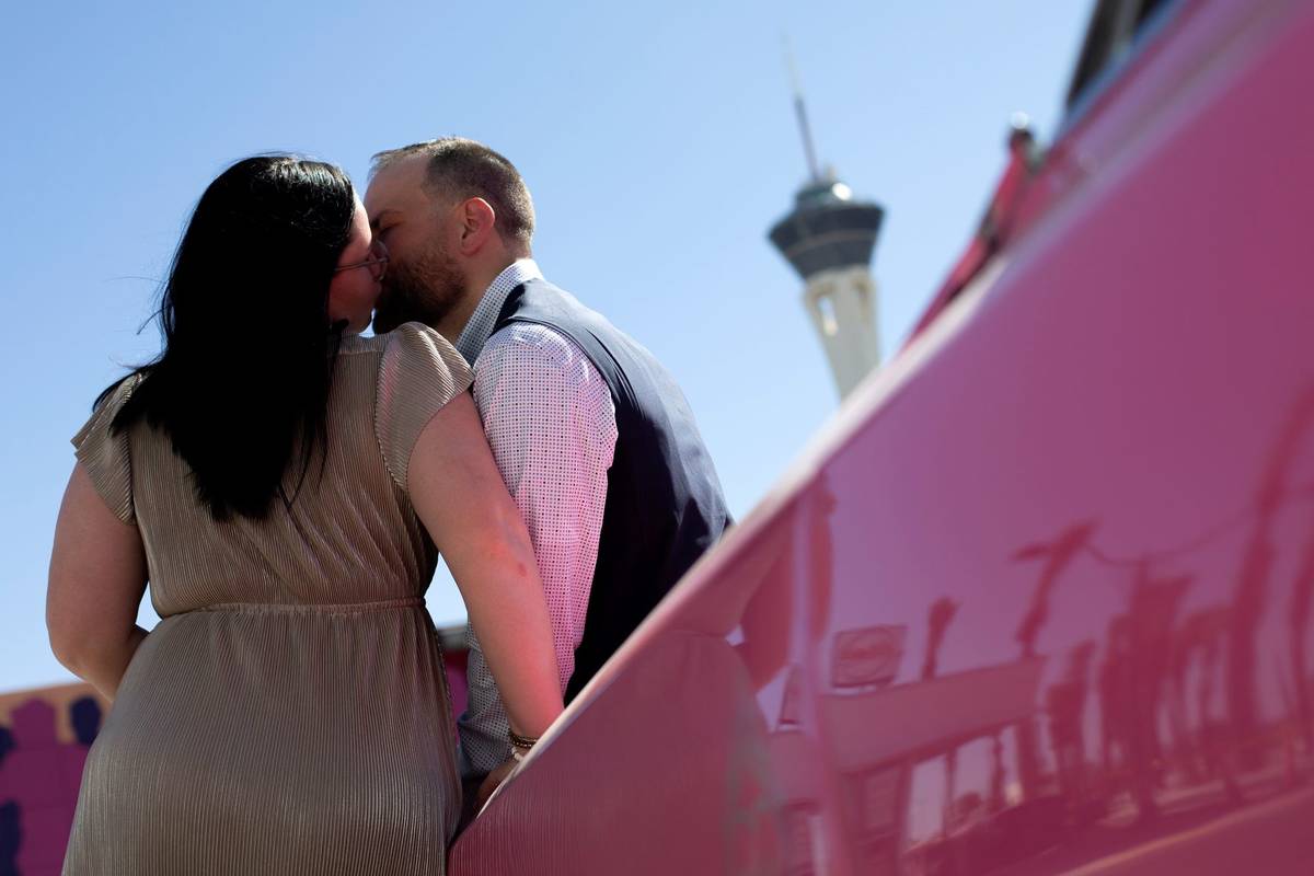 Kendra Swy and TJ Lehberger, of Michigan, share a kiss while being photographed after their wed ...