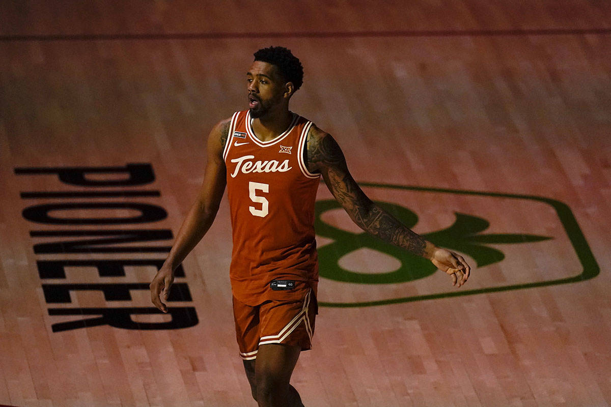 Texas forward Royce Hamm Jr. warms up before an NCAA college basketball game against Iowa State ...