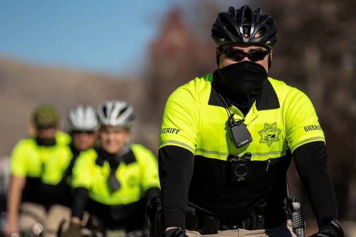 Law enforcement patrol the state Capitol complex on Sunday, Jan. 17, 2021, in Carson City. (Ben ...