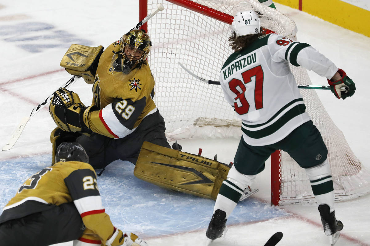 Minnesota Wild left wing Kirill Kaprizov (97) scores against Vegas Golden Knights goaltender Ma ...