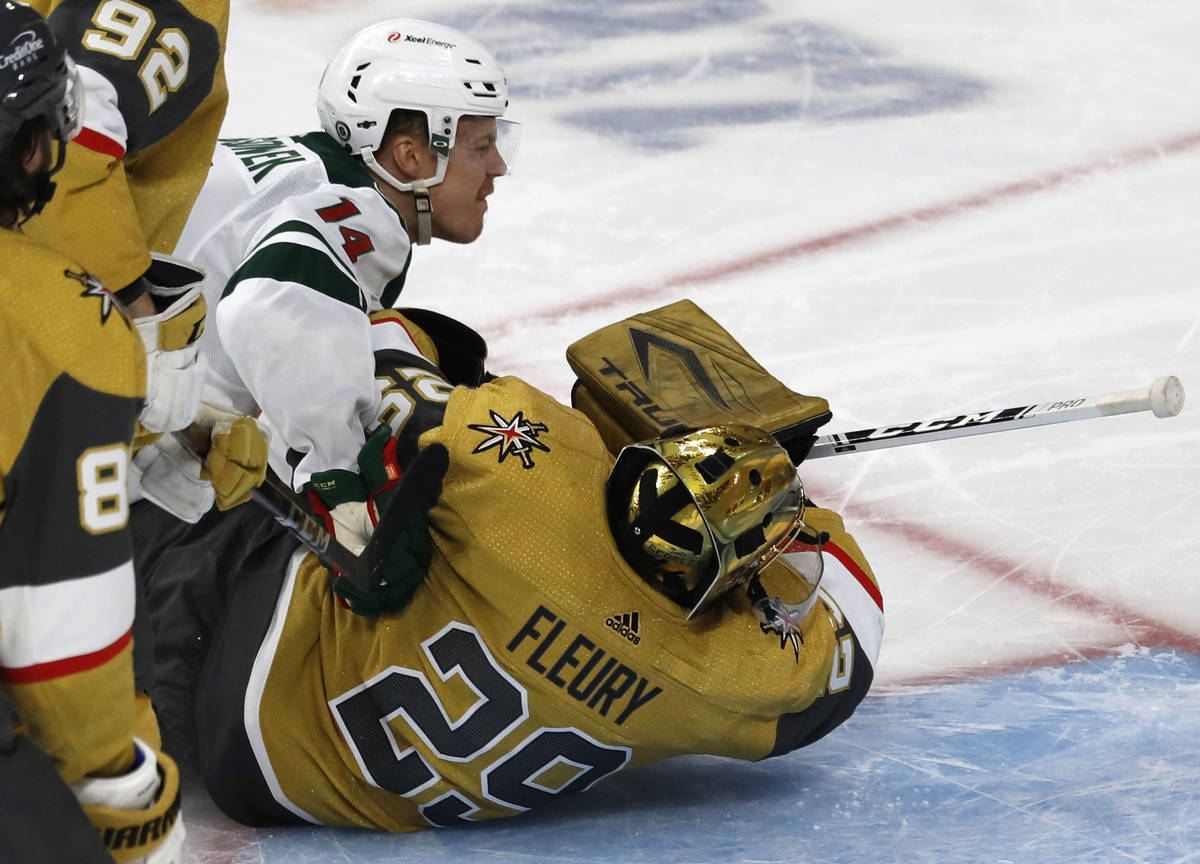 Minnesota Wild center Joel Eriksson Ek (14) scores against Vegas Golden Knights goaltender Marc ...