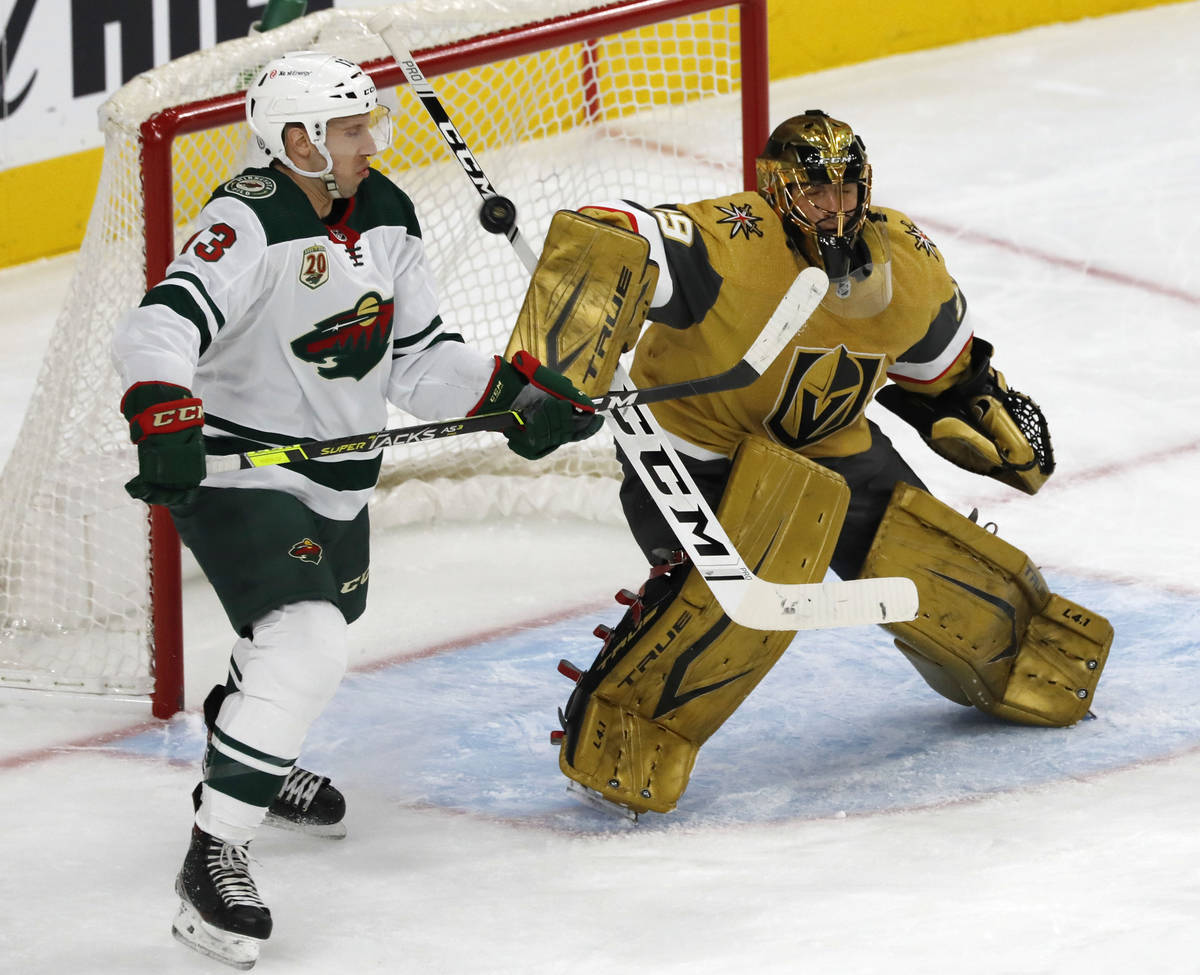 Vegas Golden Knights goaltender Marc-Andre Fleury (29) makes a save asMinnesota Wild center Nic ...