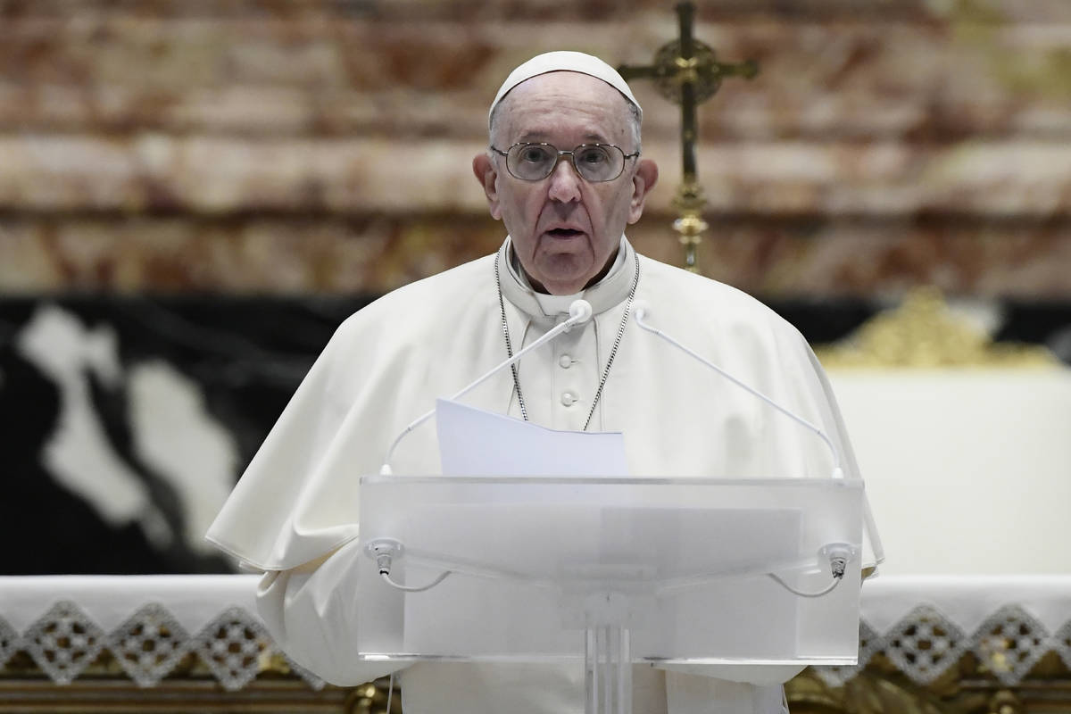 Pope Francis speaks prior to delivering his Urbi et Orbi blessing after celebrating Easter Mass ...