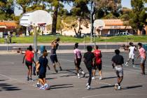 Players play a game of pickup basketball at Sunset Park on Saturday, April 3, 2021, in Las Vega ...