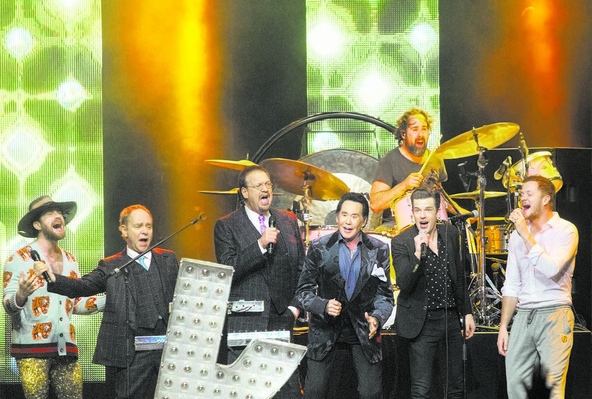 Daniel Platzman, Teller, Penn Jillette, Wayne Newton, Brandon Flowers and Dan Reynolds sing &qu ...