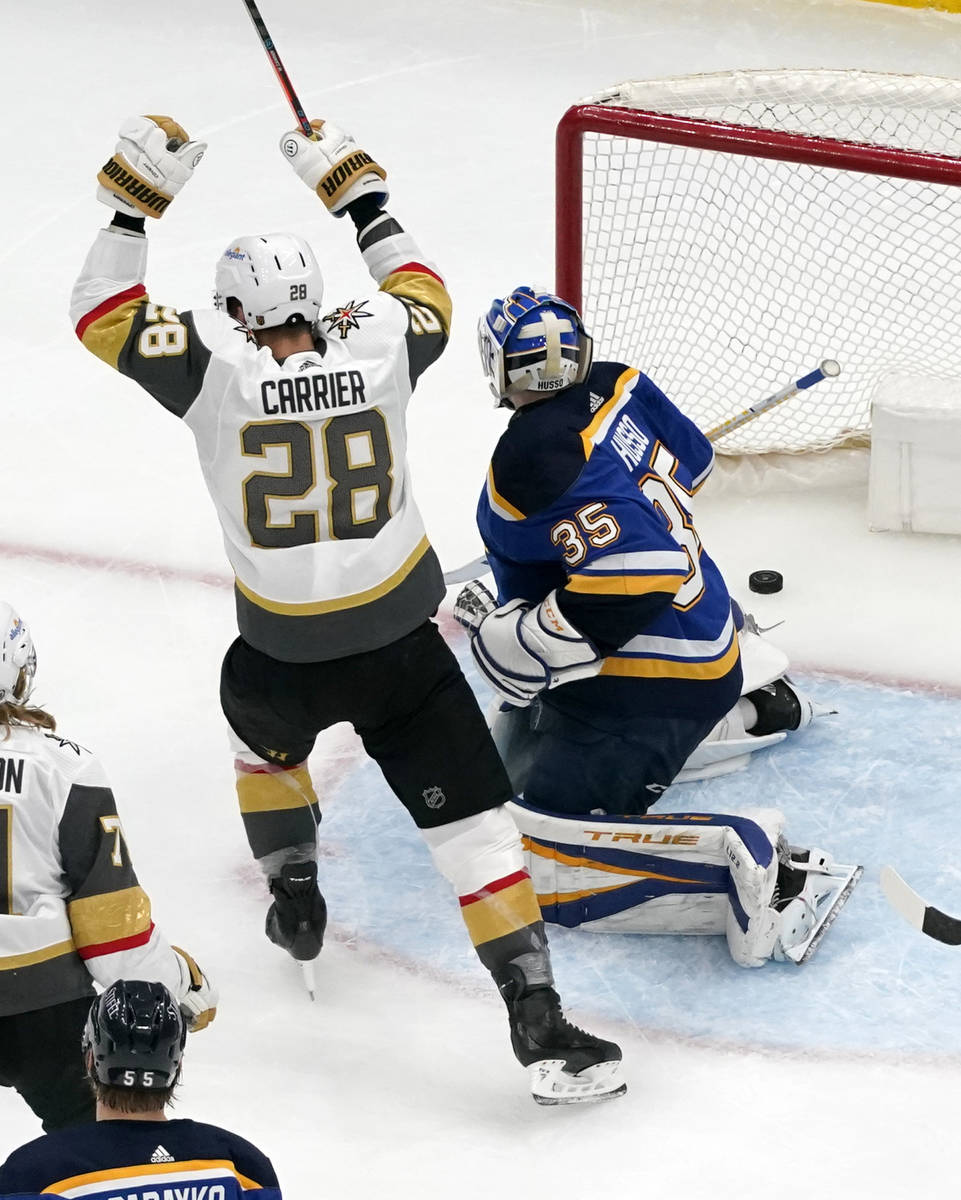 Vegas Golden Knights' William Carrier (28) celebrates after scoring past St. Louis Blues goalte ...