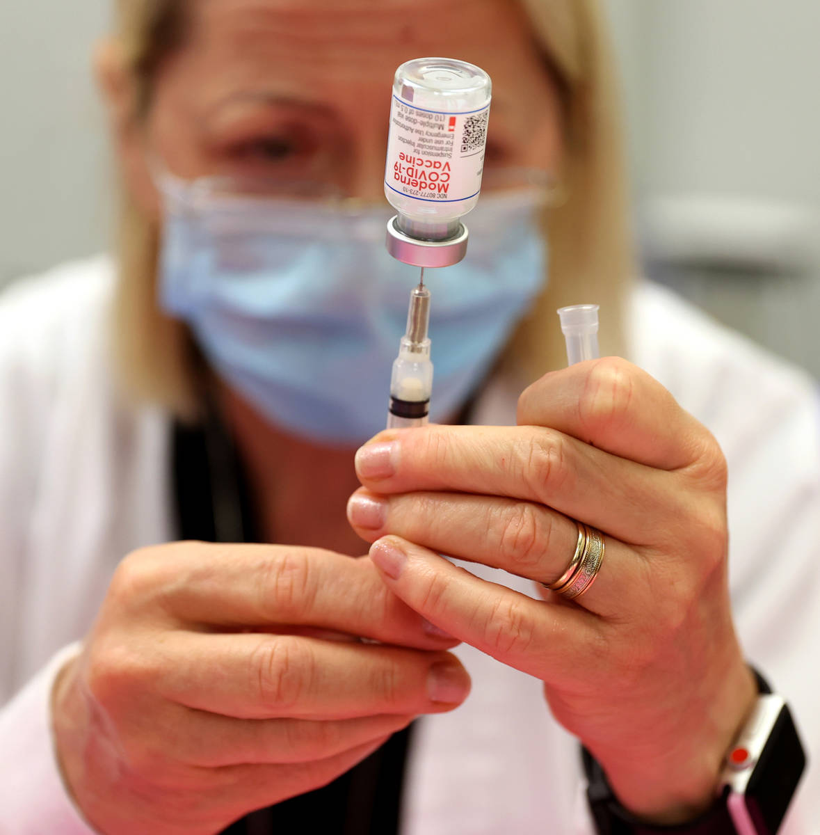 Theresa Nolan, executive director of clinical operations at UNLV Medicine, prepares COVID-19 va ...