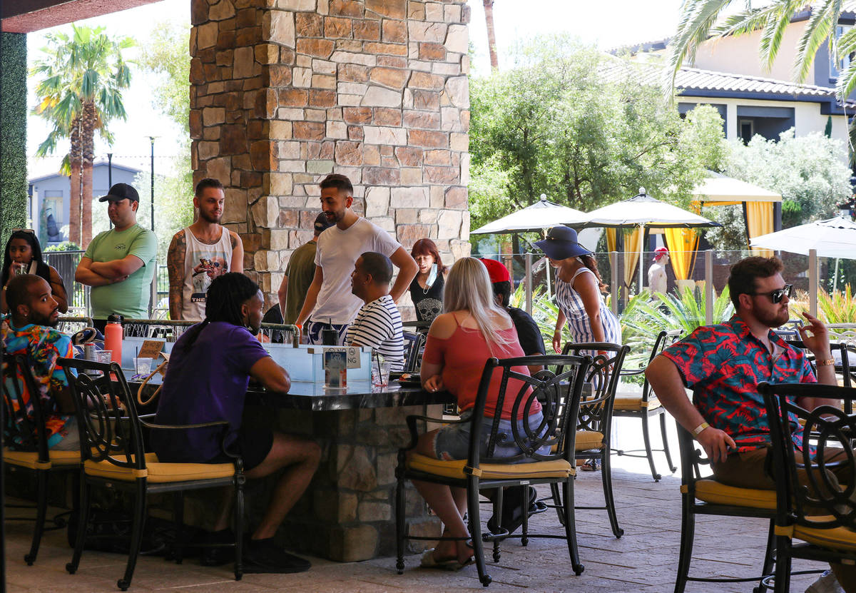 Guests eat on the 12,000 square foot patio at Becca's Restaurant & Lounge in Tuscan Highlands. ...