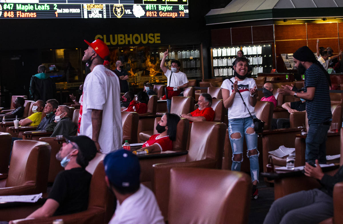 Basketball fans react as Baylor defeats Gonzaga in the NCAA championship basketball game during ...
