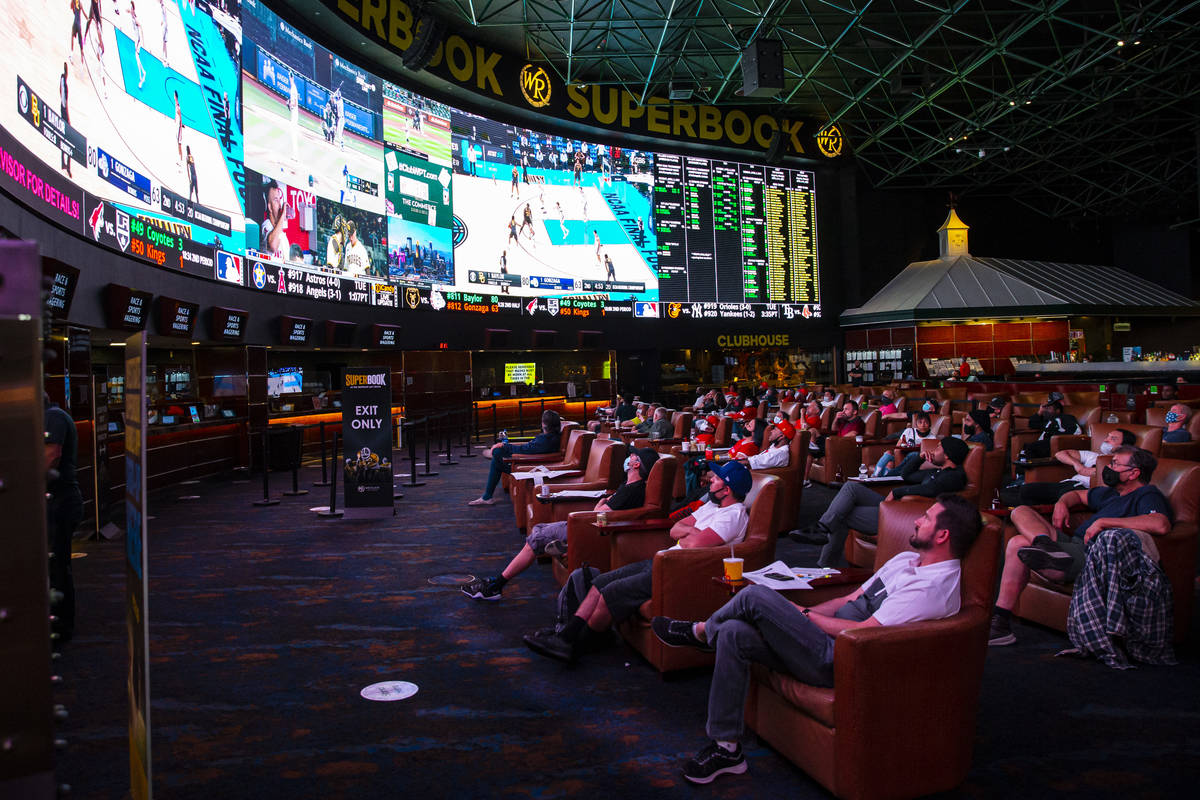Basketball fans watch the NCAA championship basketball game between Gonzaga and Baylor during a ...