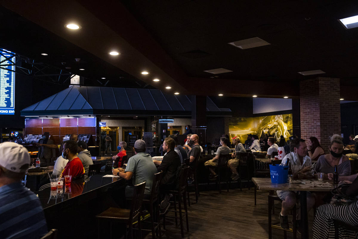Basketball fans watch the NCAA championship basketball game between Gonzaga and Baylor during a ...