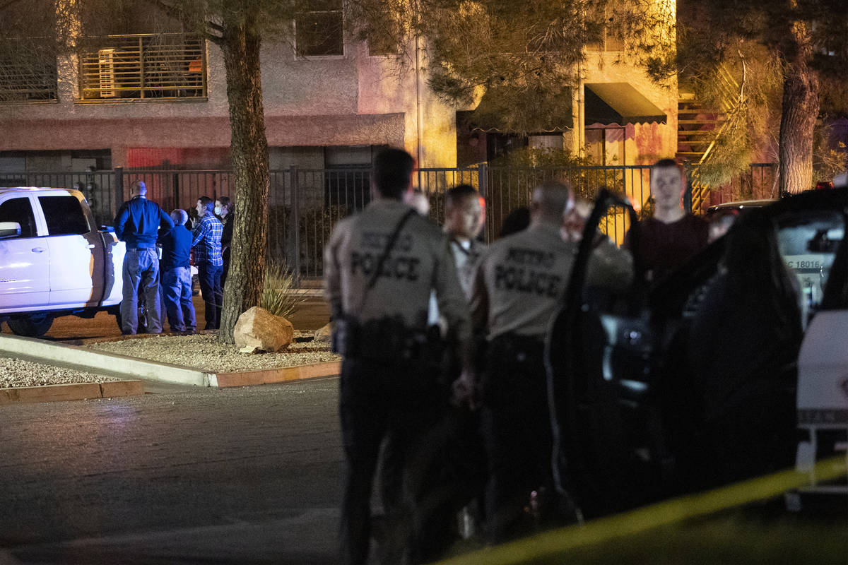 Las Vegas police investigate the scene of a homicide at the 3600 Block of Paradise Road in Las ...