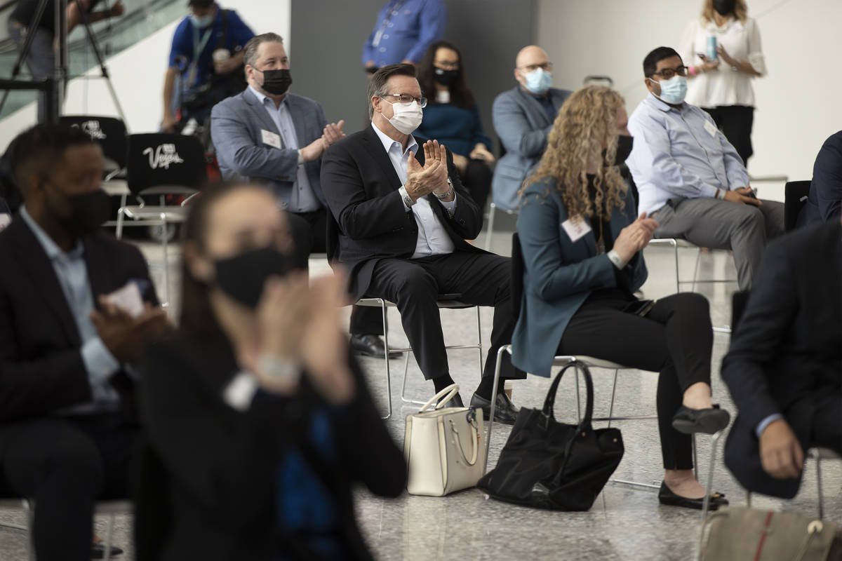 People listen to a panel discussion in the Global Meetings Industry Day at the Las Vegas Conven ...