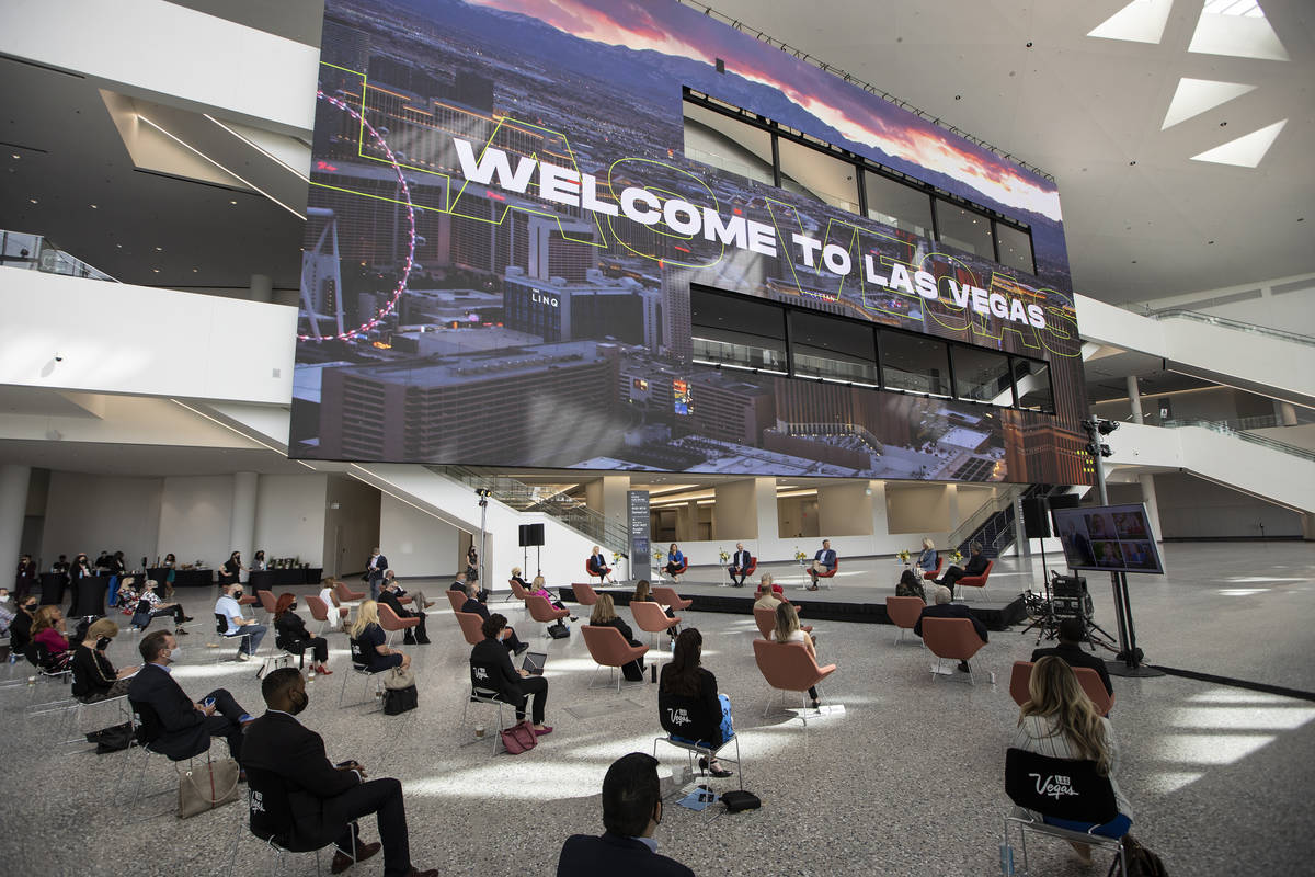 People listen to a panel discussion in the Global Meetings Industry Day at the Las Vegas Conven ...