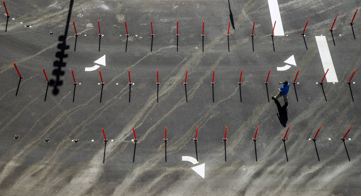 Parking and directional arrows and markers below from a balcony at the new Las Vegas Convention ...