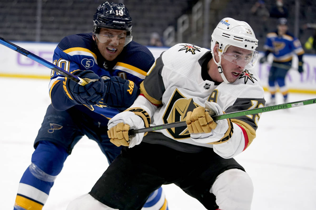 Vegas Golden Knights' Reilly Smith, right, skates as St. Louis Blues' Brayden Schenn (10) defen ...