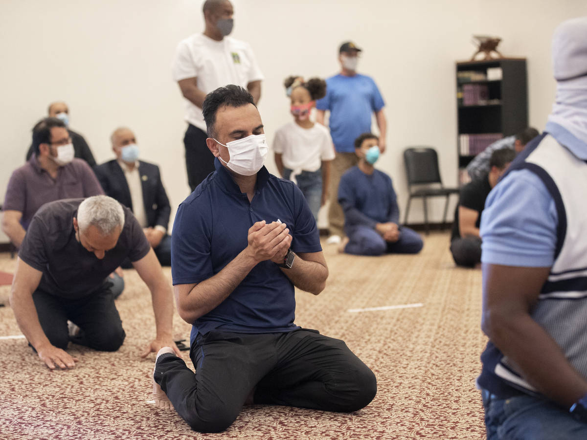 People pray at the Masjid Ibrahim Islamic Center on Friday, April 9, 2021, in Las Vegas. (Benja ...