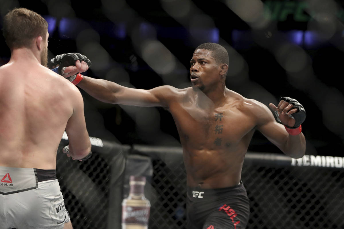 Kevin Holland, right, in action against Gerald Meerschaert during their mixed martial arts bout ...