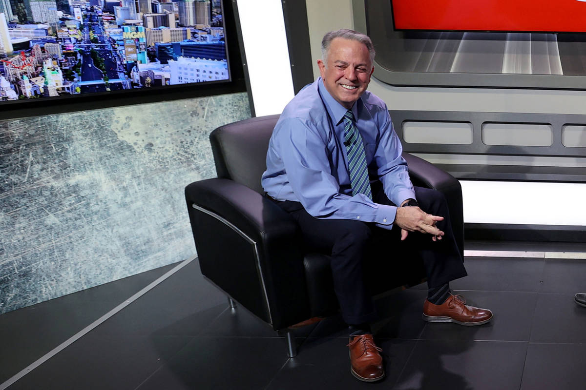 Clark County Sheriff Joe Lombardo, left, prepares for an interview with Las Vegas Review-Journa ...