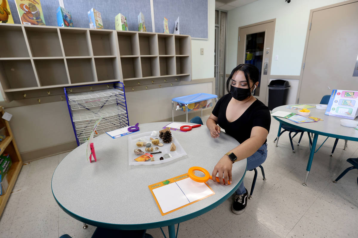 Teachers assistant Angela Hofer sets up a classroom at Capstone Christian Academy in Las Vegas ...